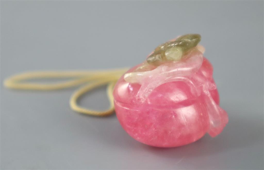 A Chinese rose quartz pendant carving of a peach and lingzhi fungus, 3.5cm